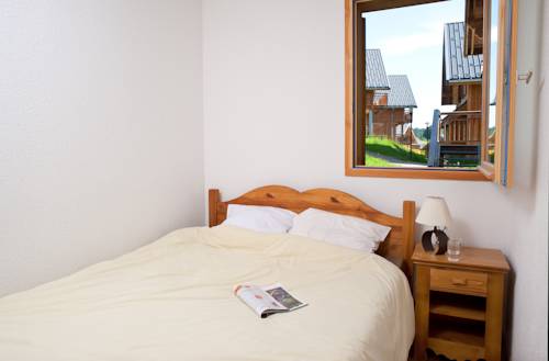 Imagen de la habitación del Madame Vacances Residence Les Chalets Du Berger. Foto 12