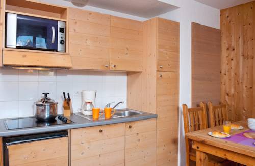 Imagen de la habitación del Madame Vacances Residence Les Chalets Du Berger. Foto 13