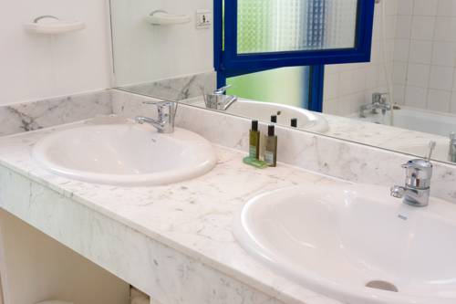 Imagen de la habitación del Madame Vacancesvillas Club Royal Aquitaine. Foto 3