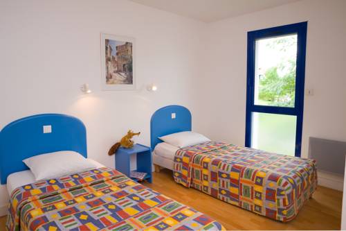 Imagen de la habitación del Madame Vacancesvillas Club Royal Aquitaine. Foto 8