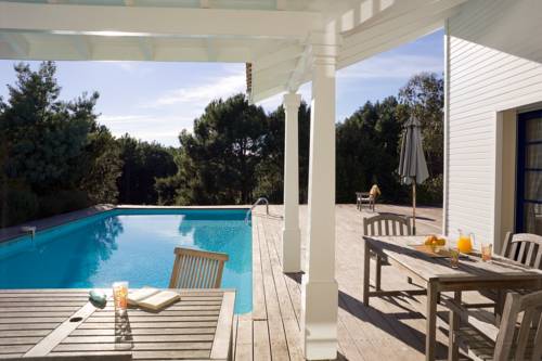 Imagen de la habitación del Madame Vacancesvillas Club Royal Aquitaine. Foto 11