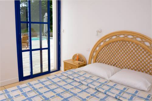 Imagen de la habitación del Madame Vacancesvillas Club Royal Aquitaine. Foto 13