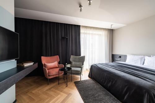 Imagen de la habitación del Maestro Design Hotel. Foto 3