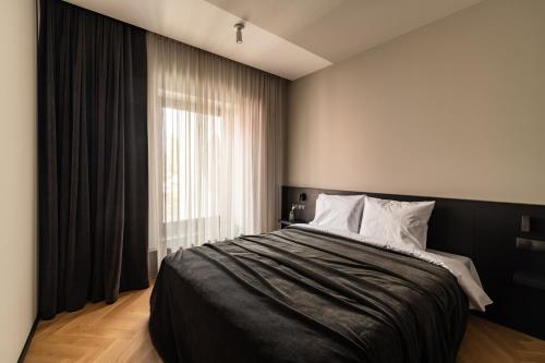 Imagen de la habitación del Maestro Design Hotel. Foto 4