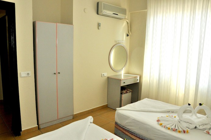 Imagen de la habitación del Magi Apart Hotel. Foto 12