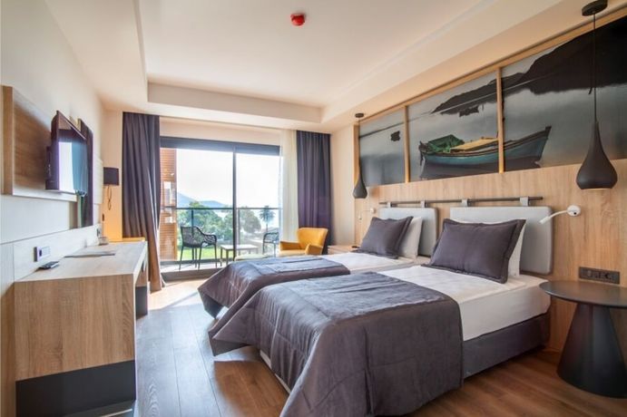 Imagen de la habitación del Maia Luxury Beach Hotel and Spa. Foto 10