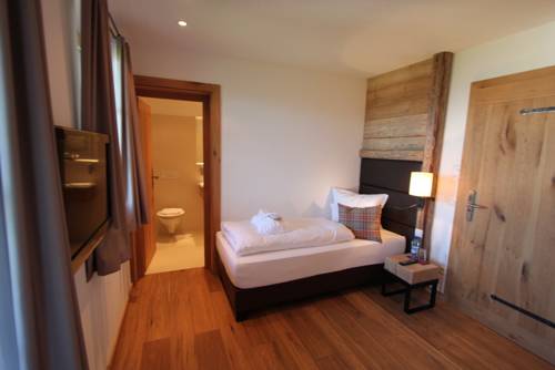 Imagen de la habitación del Maierl-alm & Maierl-chalets. Foto 9