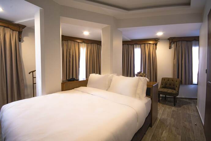 Imagen de la habitación del Maison Gali Hotel. Foto 15