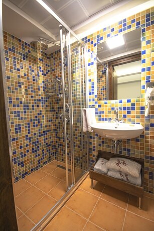 Imagen de la habitación del Maison Gali Hotel. Foto 19