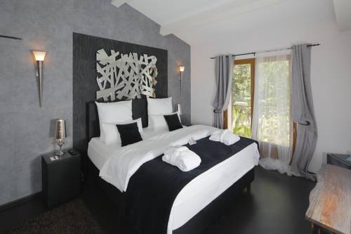 Imagen de la habitación del Maison Prestige Roberto Geissini. Foto 3