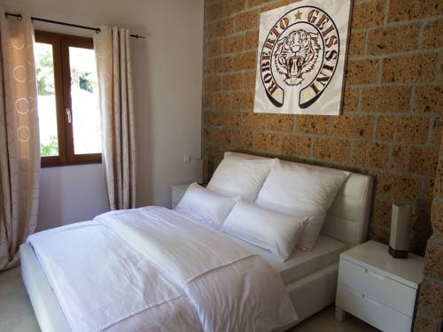 Imagen de la habitación del Maison Prestige Roberto Geissini. Foto 12