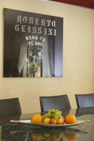 Imagen de la habitación del Maison Prestige Roberto Geissini. Foto 16