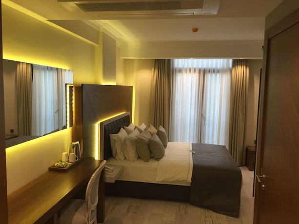 Imagen de la habitación del Maison Vourla Hotel. Foto 4