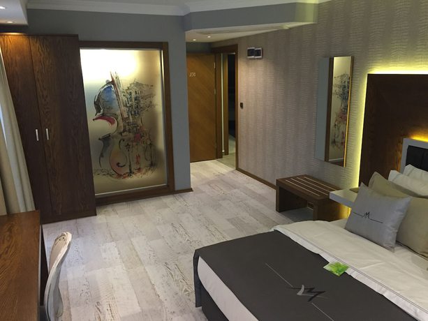 Imagen de la habitación del Maison Vourla Hotel. Foto 5