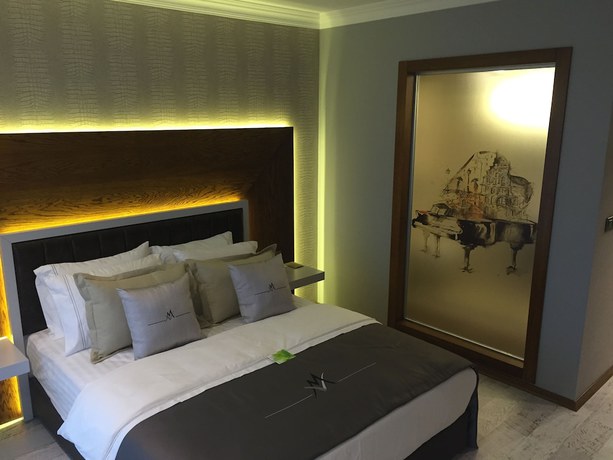 Imagen de la habitación del Maison Vourla Hotel. Foto 6