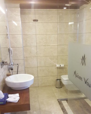 Imagen de la habitación del Maison Vourla Hotel. Foto 7