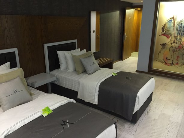 Imagen de la habitación del Maison Vourla Hotel. Foto 8