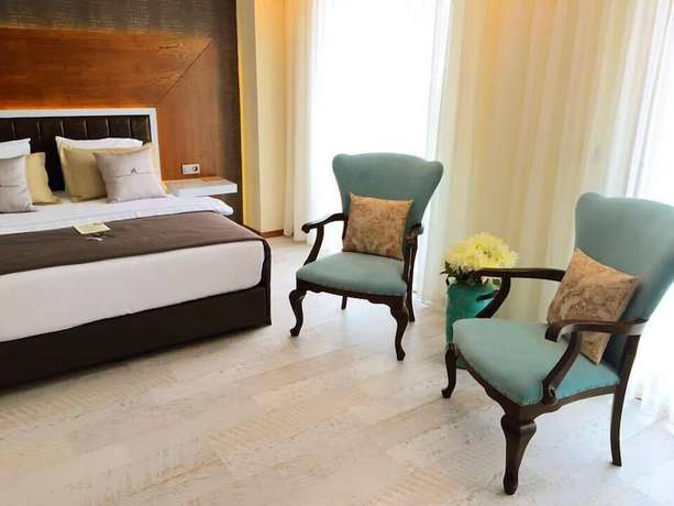 Imagen de la habitación del Maison Vourla Hotel. Foto 9