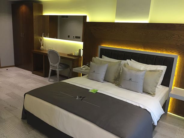 Imagen de la habitación del Maison Vourla Hotel. Foto 15
