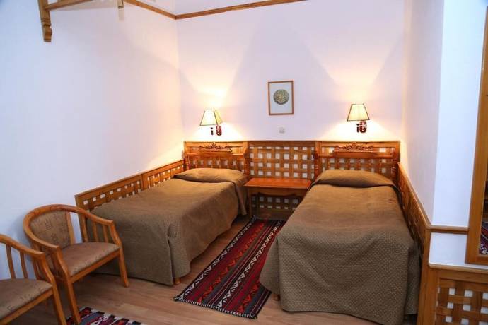 Imagen de la habitación del Malika Classic Hotel. Foto 10