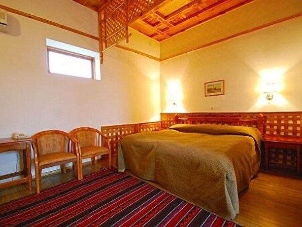 Imagen de la habitación del Malika Classic Hotel. Foto 15