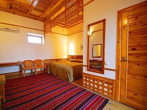 Imagen de la habitación del Malika Classic Hotel. Foto 17