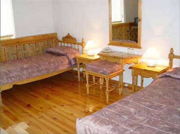 Imagen de la habitación del Malika Classic Hotel. Foto 19