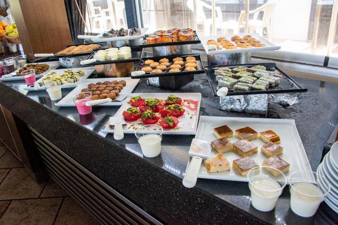 Imagen del bar/restaurante del Manaspark Deluxe Hotel. Foto 9