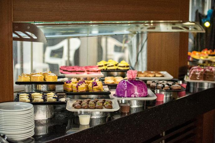 Imagen del bar/restaurante del Manaspark Deluxe Hotel. Foto 11