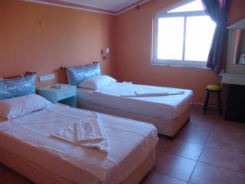 Imagen de la habitación del Mandalinn Hotel. Foto 9
