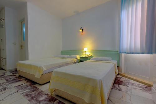 Imagen de la habitación del Mandalinn Hotel. Foto 10