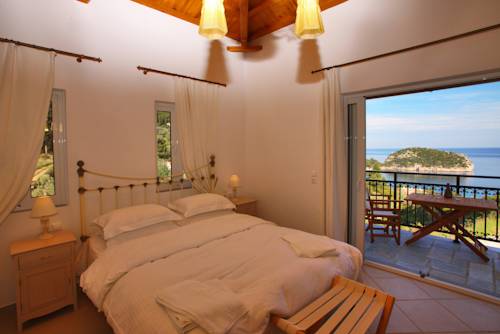 Imagen de la habitación del Mando Beachfront. Foto 5