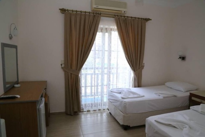 Imagen de la habitación del Manolya Hotel. Foto 9