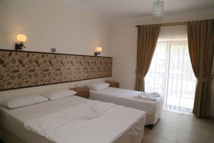 Imagen de la habitación del Manolya Hotel. Foto 17
