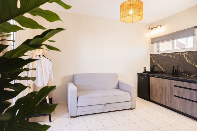 Imagen de la habitación del Manthos Beachfront Apartments. Foto 7
