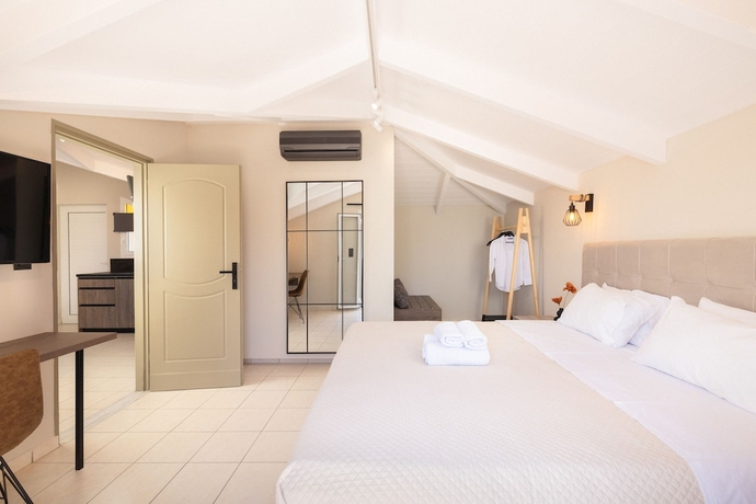 Imagen de la habitación del Manthos Beachfront Apartments. Foto 12
