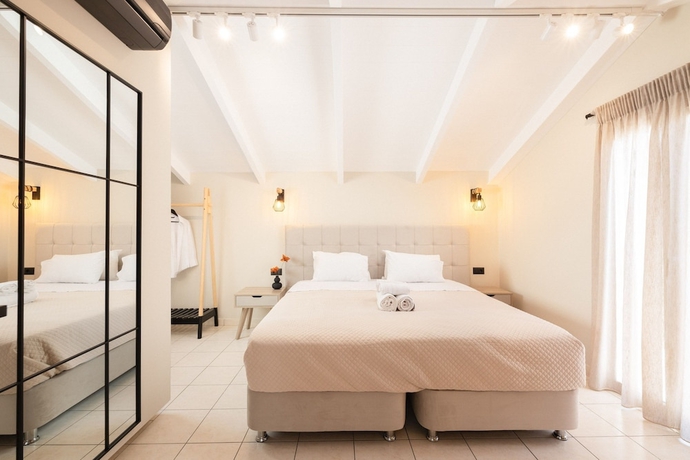 Imagen de la habitación del Manthos Beachfront Apartments. Foto 14