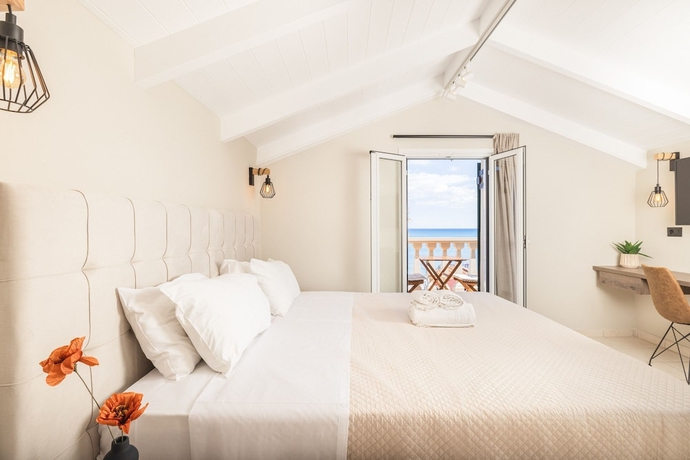 Imagen de la habitación del Manthos Beachfront Apartments. Foto 16