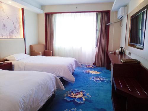 Imagen de la habitación del Manzhouli Port International Hotel. Foto 9