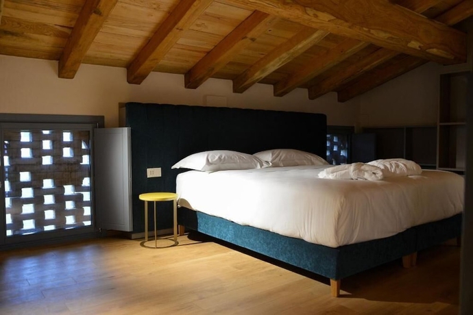 Imagen de la habitación del Maranello Resort Borgo della Montina. Foto 8