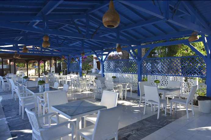 Imagen del bar/restaurante del Marble Arch By Perili Hotel. Foto 7