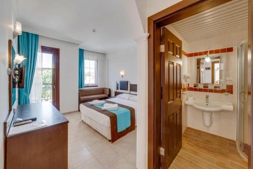 Imagen de la habitación del Marcan Beach Hotel. Foto 17