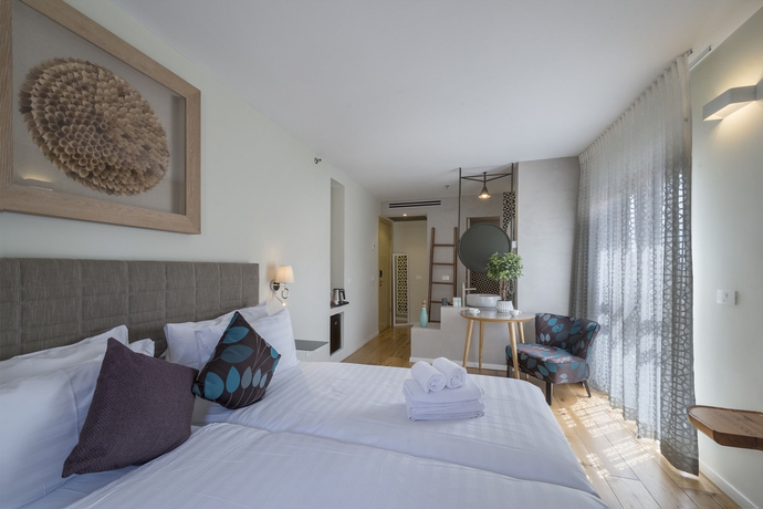 Imagen de la habitación del Margosa Hotel. Foto 7