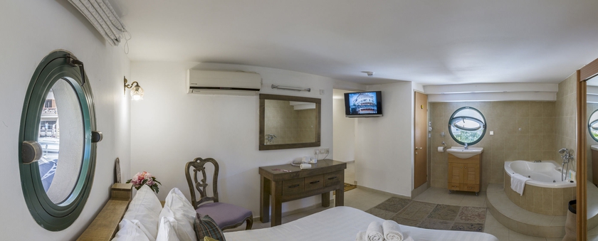 Imagen de la habitación del Margosa Hotel. Foto 10