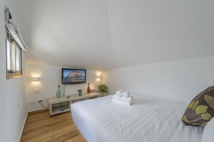 Imagen de la habitación del Margosa Hotel. Foto 12