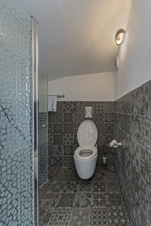 Imagen de la habitación del Margosa Hotel. Foto 14