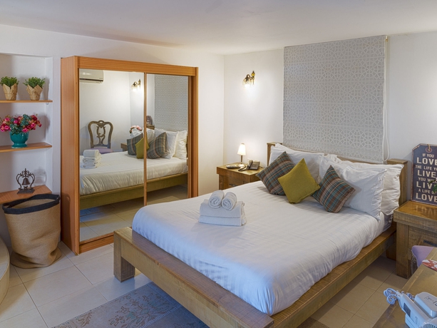 Imagen de la habitación del Margosa Hotel. Foto 15