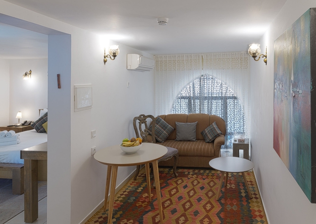 Imagen de la habitación del Margosa Hotel. Foto 16