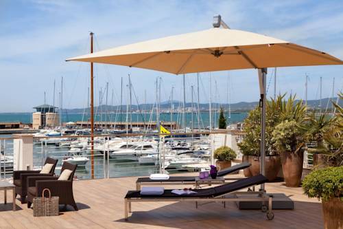 Imagen de la habitación del Marina Di Scarlino Resort. Foto 7