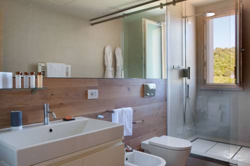 Imagen de la habitación del Marina Di Scarlino Resort. Foto 10